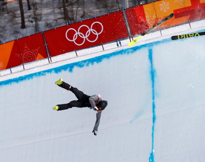 Joel Gisler falls after crashing during the halfpipe event. 