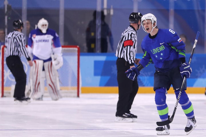 Ziga Jeglic #8 of Slovenia celebrates after scoring the winning goal in a shootout against Slovakia during the Men's Ice Hock