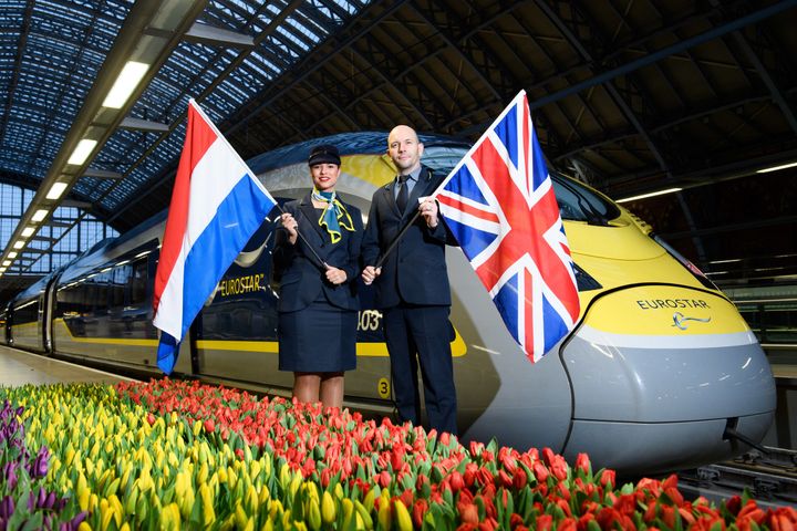 Eurostar staff members Emma Jane Timperley and Stephane Aupre are seen as the inaugural Eurostar service sets off from London to Amsterdam