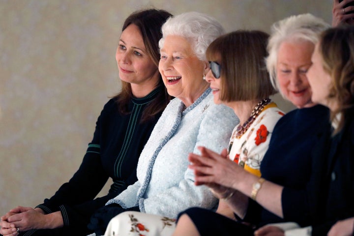 From left, British Fashion Council chief executive Caroline Rush, Queen Elizabeth II and Vogue Editor-in-Chief Anna Wintour attend the Richard Quinn show during London Fashion Week on Feb. 20, 2018, in London.