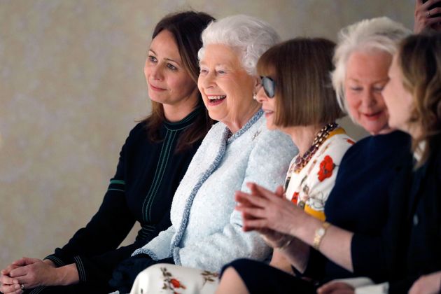 From left, British Fashion Council chief executive Caroline Rush, Queen Elizabeth II and Vogue Editor-in-Chief Anna Wintour attend the Richard Quinn show during London Fashion Week on Feb. 20, 2018, in London.