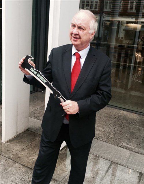 David Jamieson poses with a 'Head Splitter' during his campaign to ban zombie knives