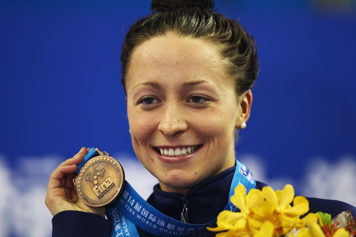 Ariana Kukors holds up her bronze medal for the women's 200-meter individual medley final during the 14th FINA World Championships on July 25, 2011.