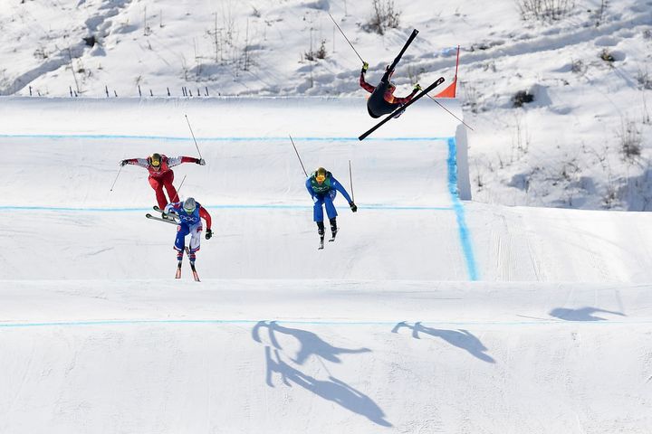 Canada's Christopher Delbosco, right, falls during the men's ski cross quarter-final in Pyeongchang, South Korea.