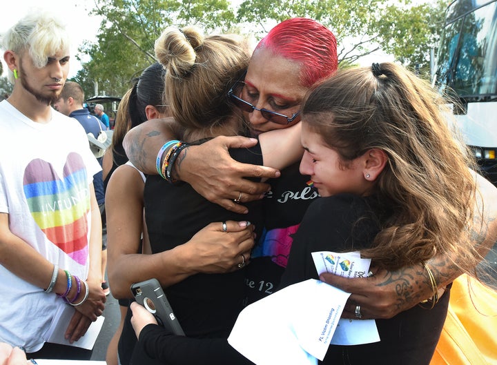 Pulse nightclub survivor India Goodman hugs and comforts students before they left for Tallahassee on Feb. 20, 2018.