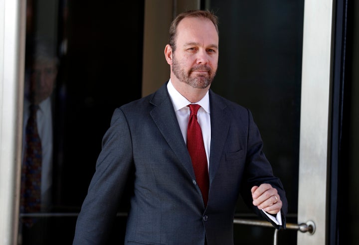 Rick Gates, former campaign aide to U.S. President Donald Trump, departs after a bond hearing at U.S. District Court in Washington, U.S., December 11, 2017. 