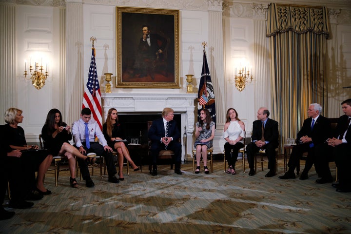 President Donald Trump hosts a listening session with high school students, parents and teachers to discuss school safety at the White House on Wednesday.