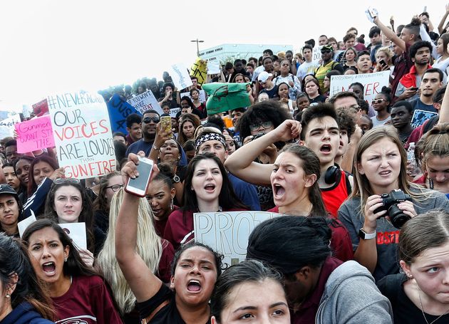 Students rally at Marjory Stoneman Douglas High School in Parkland, Florida, after participating in a national school walkout on Wednesday.