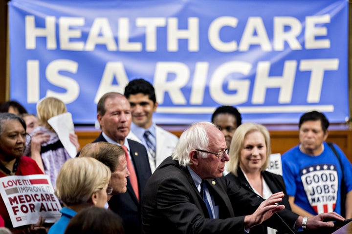 Senator Bernie Sanders (I-Vt.), center, speaks at a Sept. 13, 2017, news conference on GOP health care legislation on Capitol Hill as Democrats call for single-payer proposals to be considered.