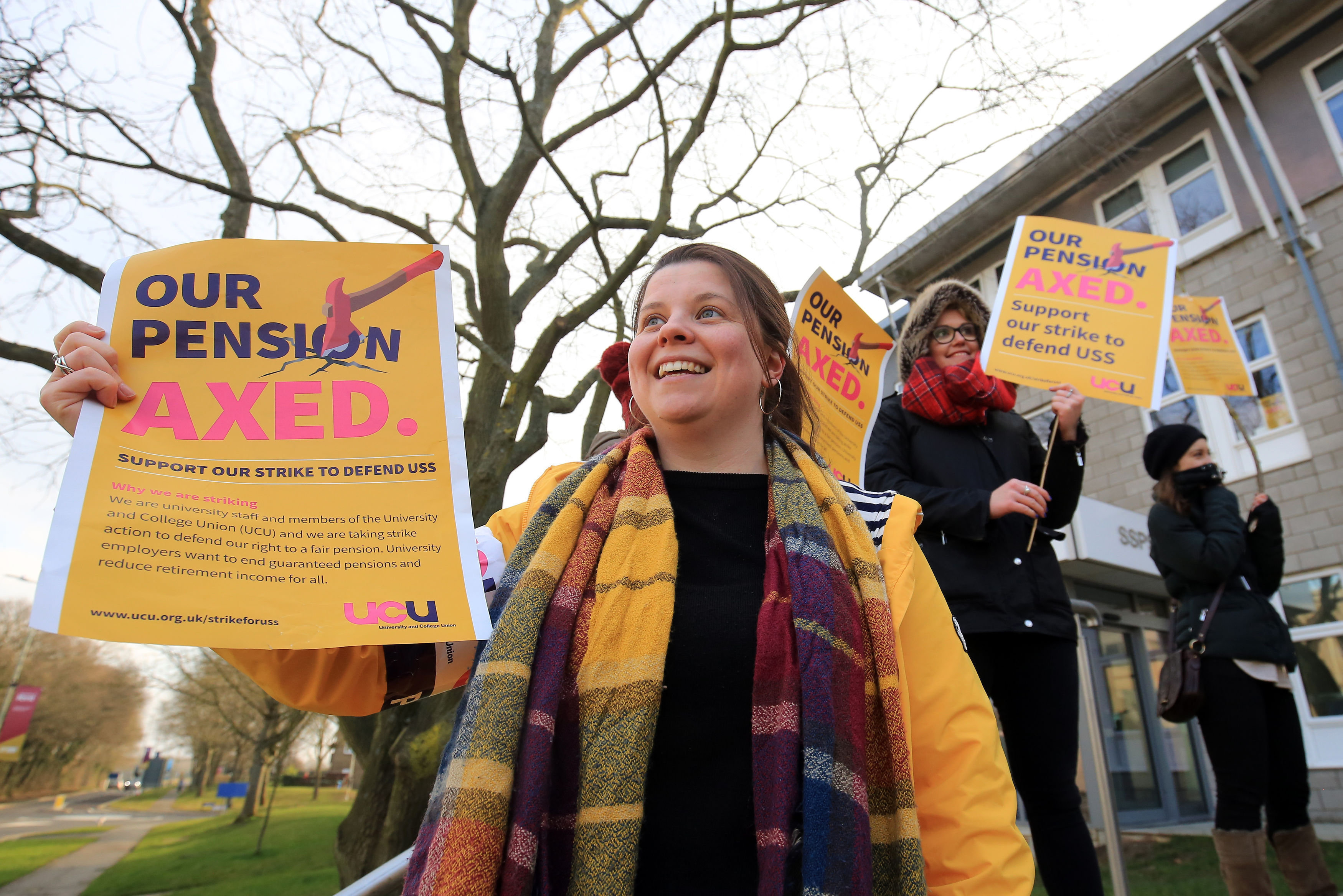 University and College Union members strike outside the University of Kent campus in Canterbury