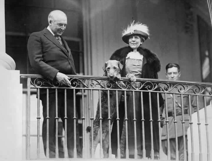 Harding and his wife, Florence, watching an annual White House Easter event with Laddie Boy, circa 1922. 