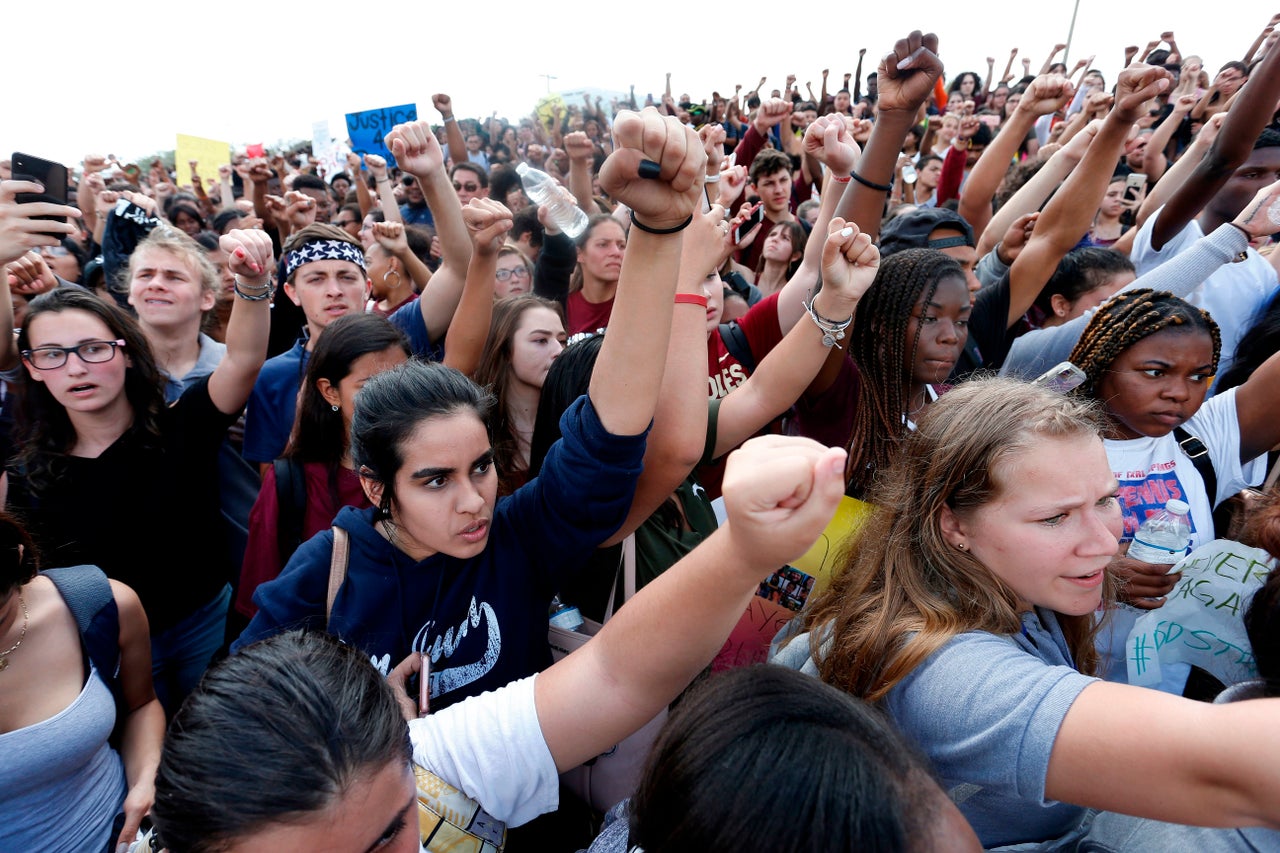 Students rally at Marjory Stoneman Douglas High School after participating in a county wide school walk out in Parkland, Florida on Feb. 21, 2018.