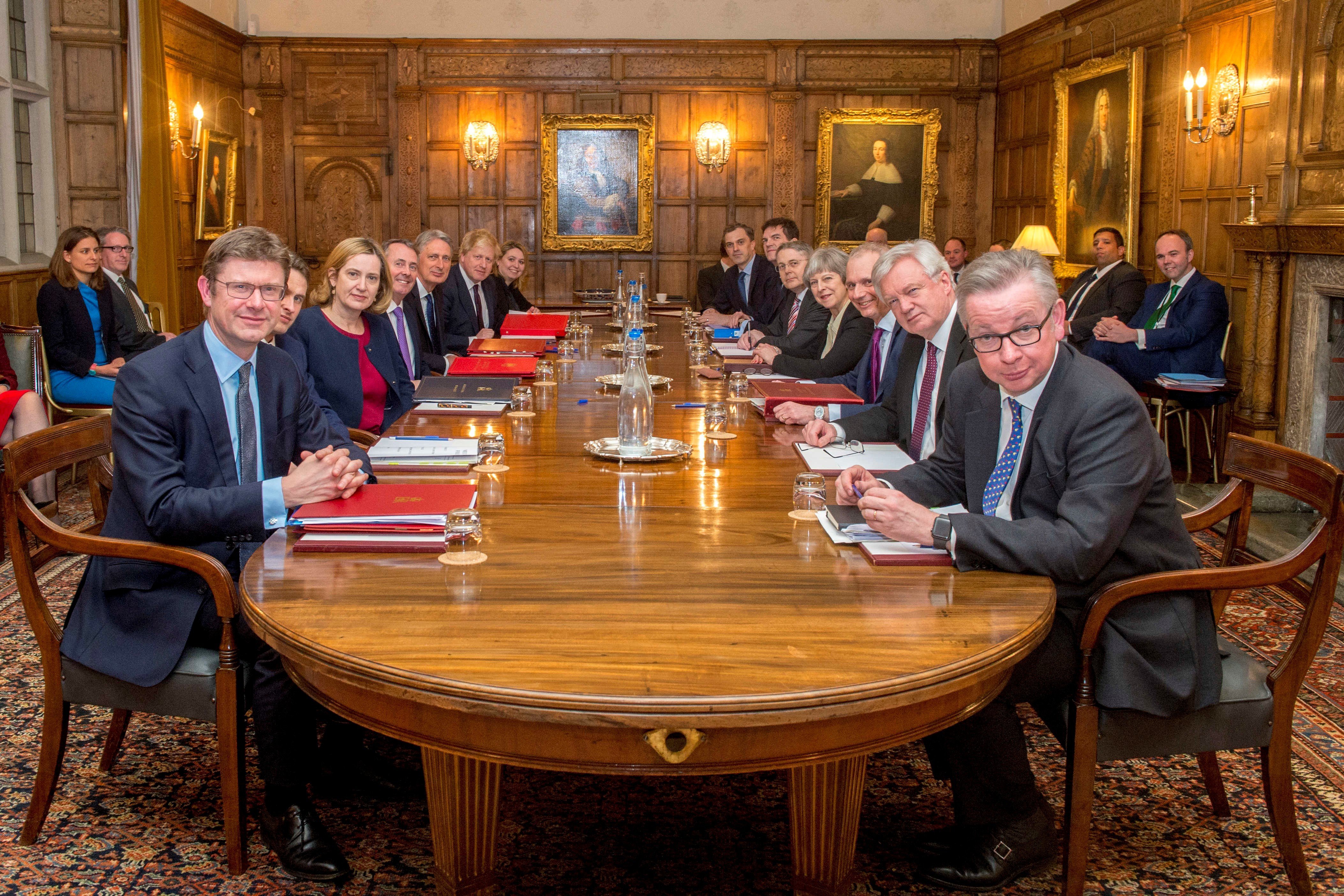 Theresa May poses with members of the EUXT (SN) sub-Committee on February 22, 2018 in Aylesbury, England.