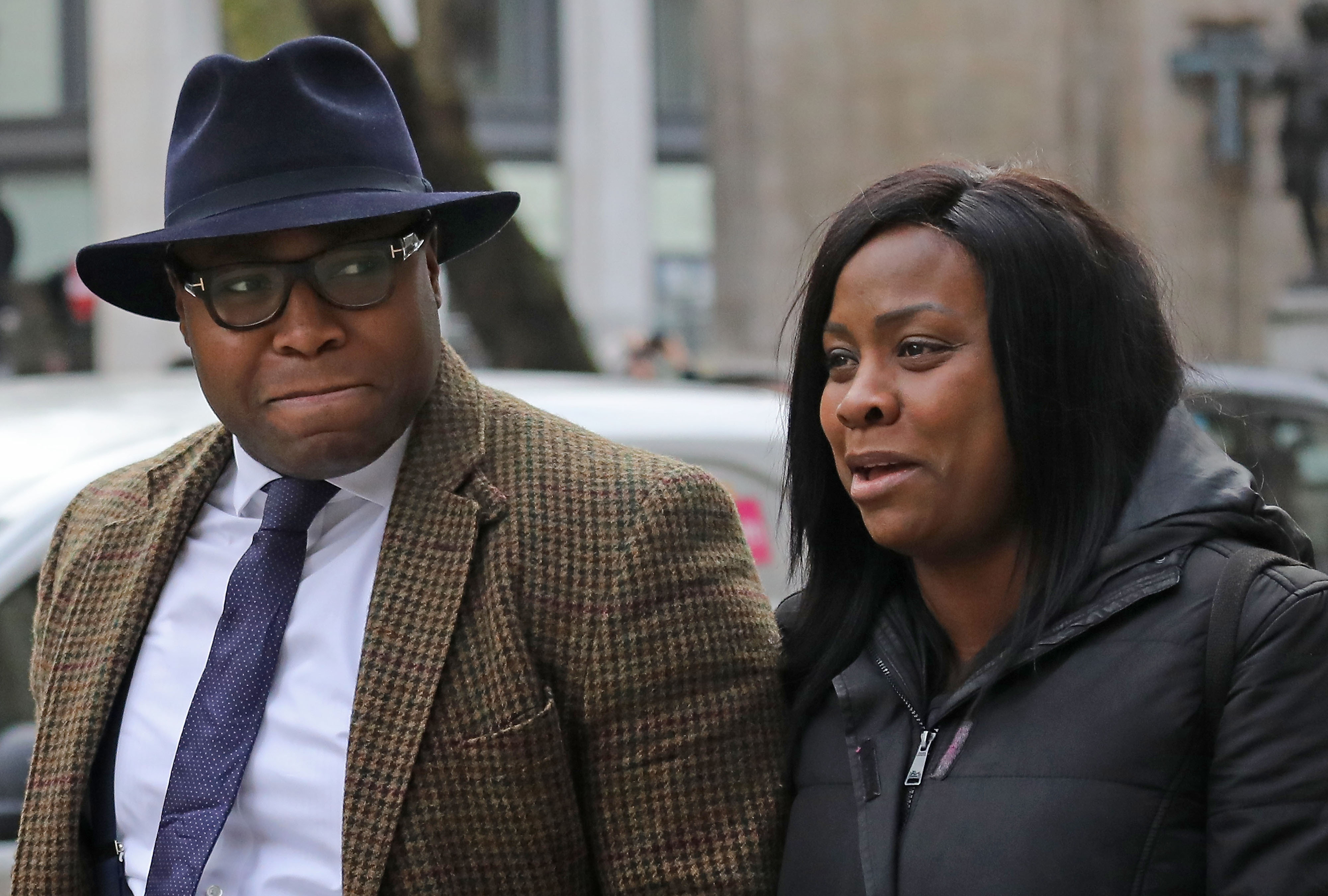 <strong>Isaiah Haastrup's mother Takesha Thomas and father Lanre Haastrup outside the High Court in London</strong>