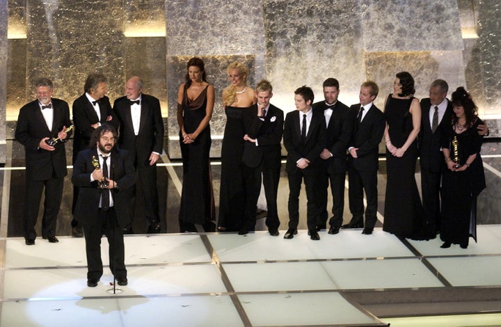 Peter Jackson with cast and producers as he accepts his award for Best Picture for "The Lord of the Rings: The Return of the King."