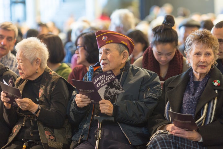 Japanese-Americans and their families sit in the audience to hear Khizr Khan speak on Feb. 19, 2018 in Seattle.