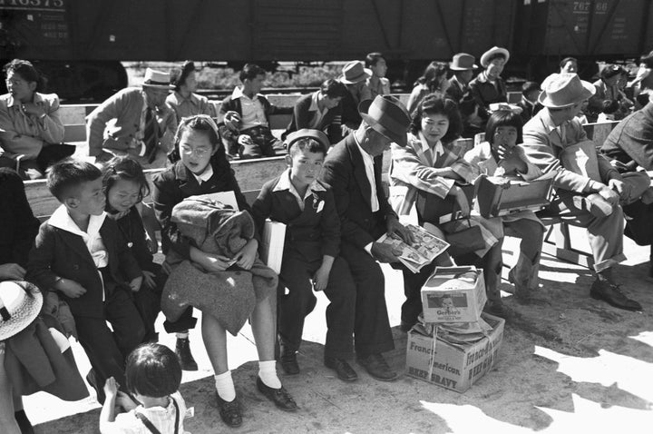 Japanese-Americans wait to be registered by the U.S. government in Los Angeles in April 1942.