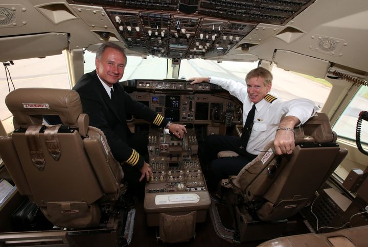 President Donald Trump's personal pilot, John Dunkin (left), is reportedly under consideration to lead the FAA.