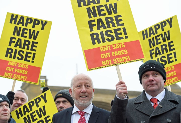 Shadow transport secretary Andy McDonald with protesters 