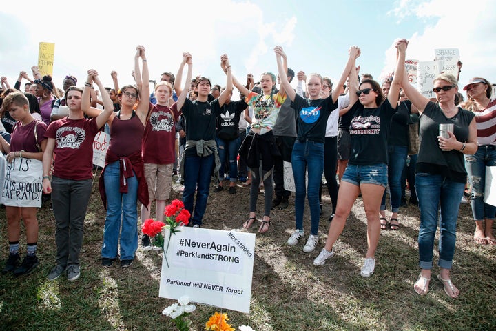 High school students participate in a county-wide walk out in Parkland, Florida, last week following the Feb. 14 school shooting in the community that left 17 people dead.