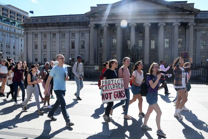 Hundreds of high school and middle school students from the District of Columbia, Maryland and Virginia walk from the U.S. Treasury to the White House in support of gun control on Feb. 21.