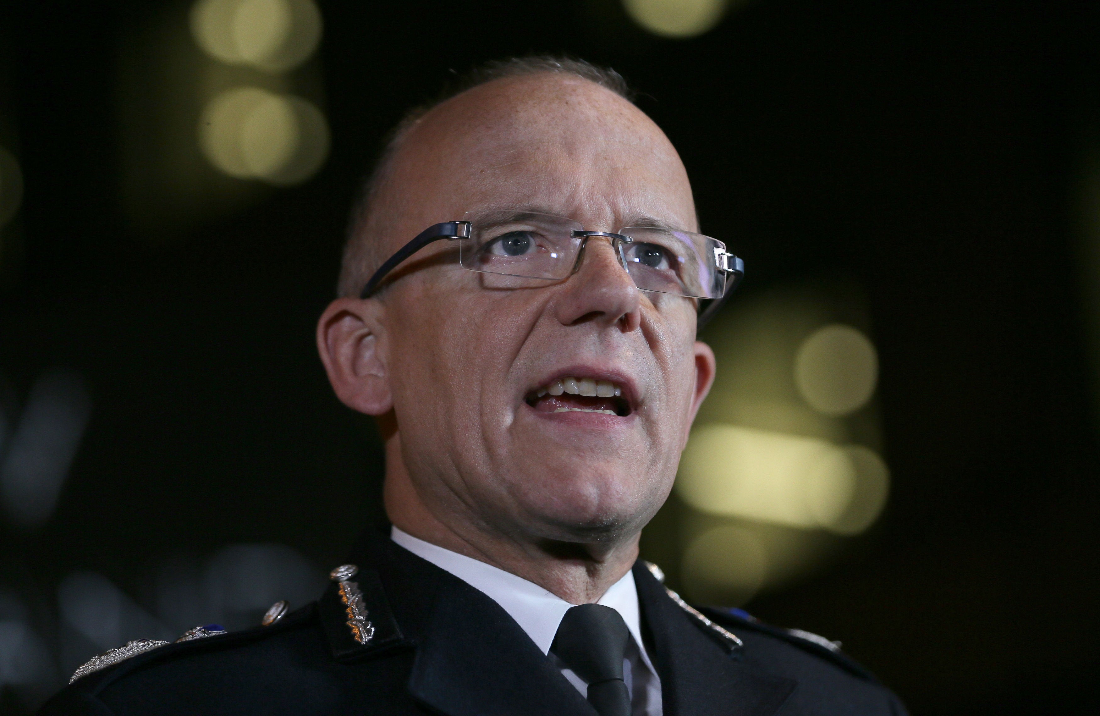 <strong>Assistant Commissioner Mark Rowley delivers a statement outside New Scotland Yard, London last year</strong>