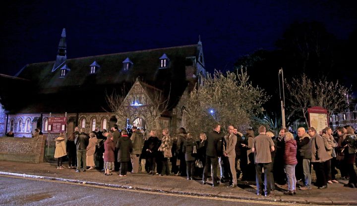 Mourners gather at St. Matthews Church in Worthing, West Sussex, for a memorial service for Stuart and Jason Hill, who were killed alongside Becky Dobson in a helicopter crash in the Grand Canyon.
