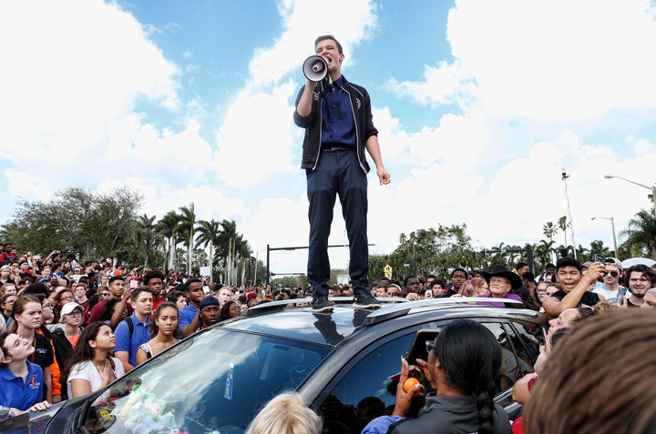 Marjory Stoneman Douglas High School student Cameron Kasky addresses fellow students after participating in a nationwide school walkout to protest inaction on gun violence.