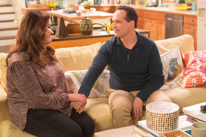 Katy Mizon and Diedrich Bader on "American Housewife."