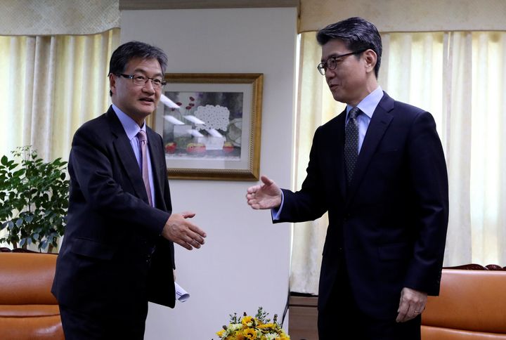 Joseph Yun, left, the State Department's top official on North Korea policy, will retire Friday. Here he meets with South Korean diplomat Kim Hong-kyun in November 2016.