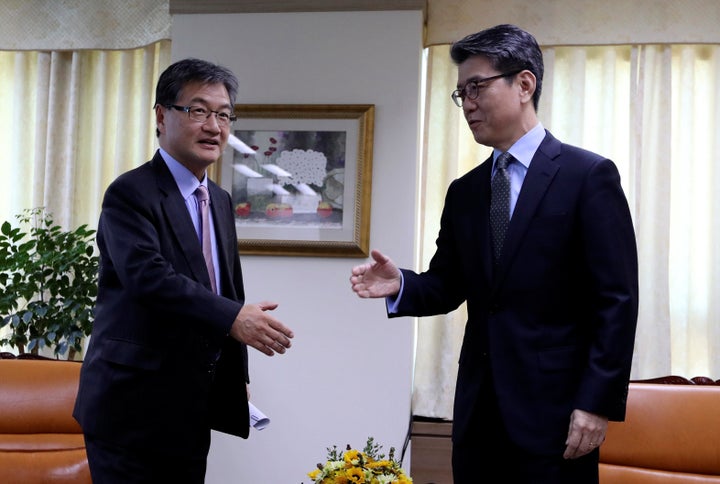 Joseph Yun, left, the State Department's top official on North Korea policy, will retire Friday. Here he meets with Sout