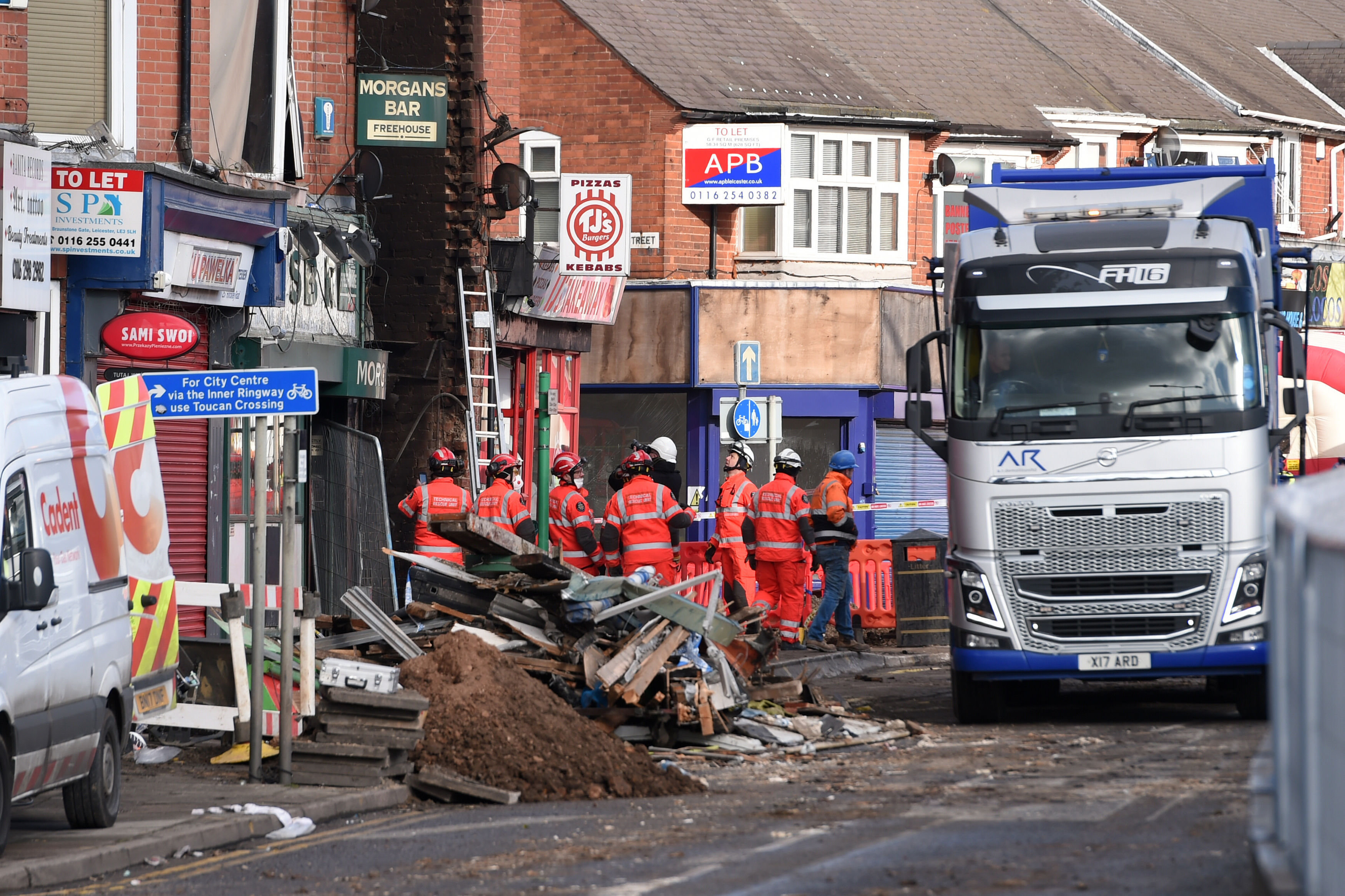 <strong>Emergency personnel at the scene of the blast in Hinckley Road in Leicester</strong>