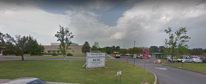 A teacher at Dalton High School in Georgia has been taken into custody after police said a gun was fired inside of a classroom.