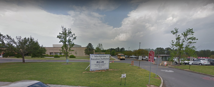 A teacher at Dalton High School in Georgia has been taken into custody after police said a gun was fired inside of a classroom.