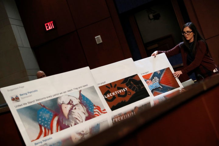 Facebook pages created by Russian trolls at the Internet Research Agency are displayed during a congressional oversight hearing, Nov. 1, 2017.