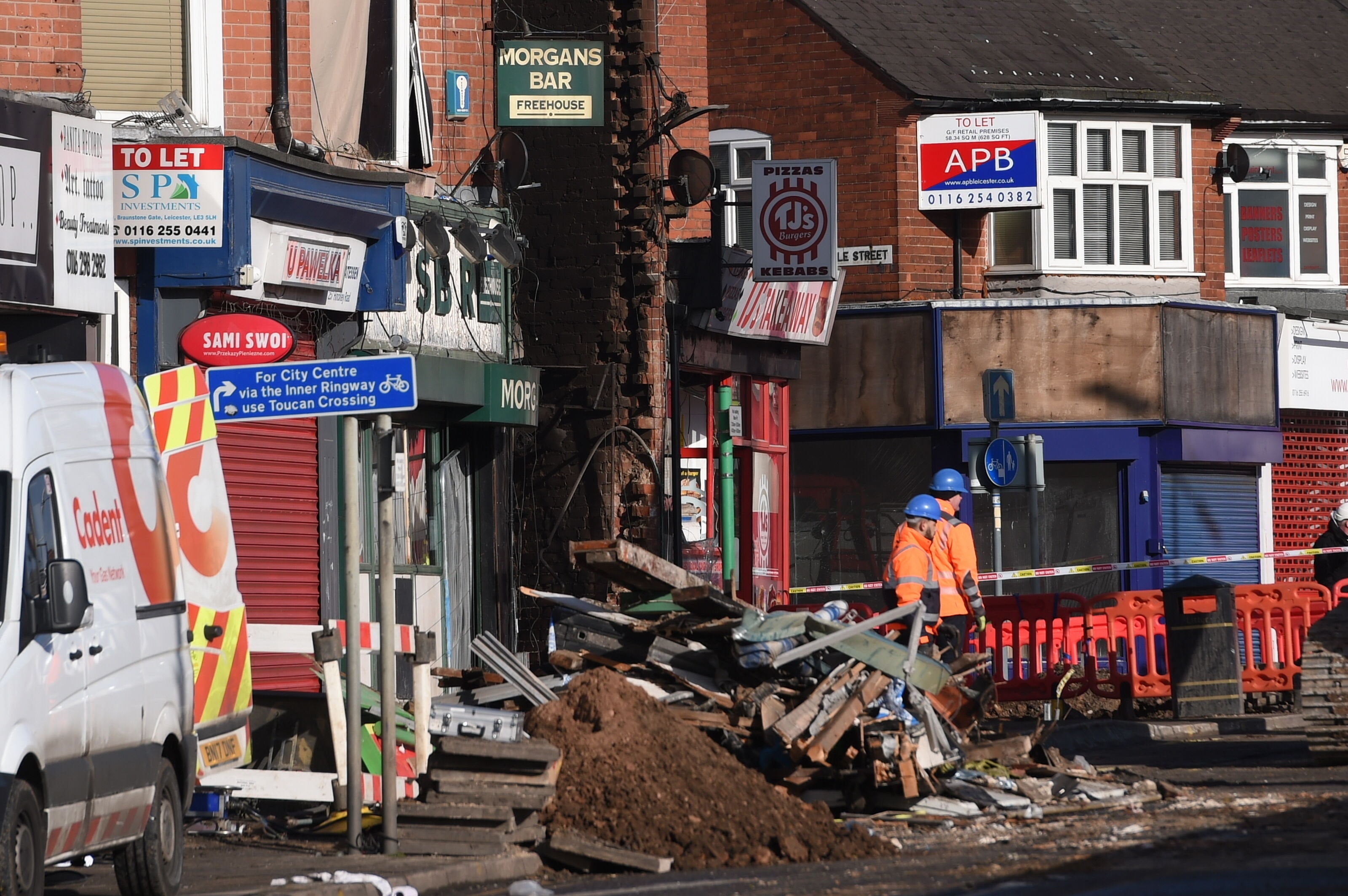 <strong>Emergency&nbsp;services&nbsp;work at the scene of the explosion.</strong>