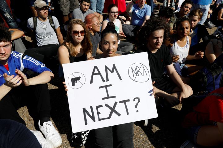 Students who walked out of their Montgomery County, Maryland, schools protest against gun violence in front of the White House.