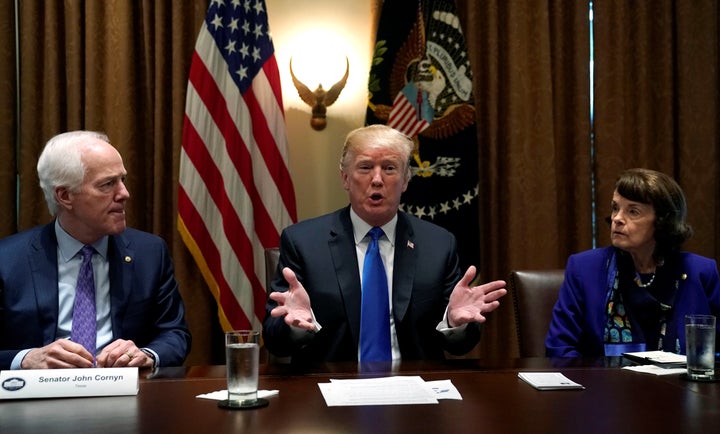 Flanked by Senators John Cornyn (R-TX) and Dianne Feinstein (D-Calif.) U.S. President Donald Trump meets with bi-partisan members of Congress to discuss school and community safety in the wake of the Florida school shootings