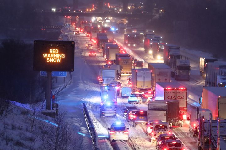 Drivers stranded in cars overnight on the M80 due to snow and freezing temperatures.