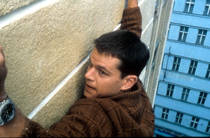 Matt Damon hangs on in "The Bourne Identity," which launched the franchise in 2001.