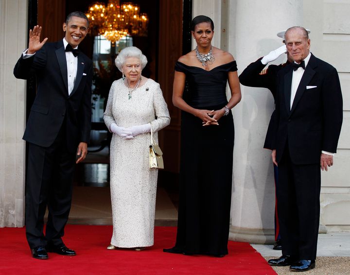 President Barack Obama and first lady Michelle Obama appear with Queen Elizabeth and Prince Philip on a state visit to the U.K. in 2011.
