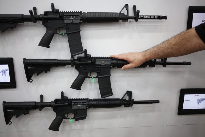 AR-15 rifles are displayed on the exhibit floor during the National Rifle Association's 2016 meeting in Louisville, Kentucky. 