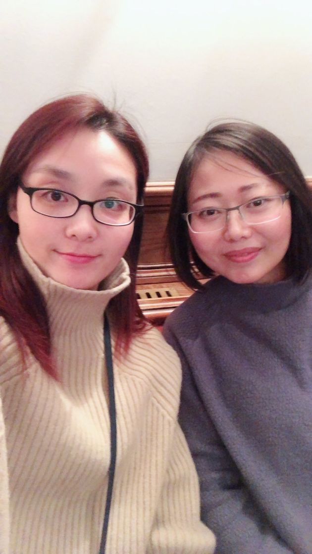 Serena Gao (right) and her friend Liya Xu slept at the pub overnight after being rescued from a stranded Megabus 