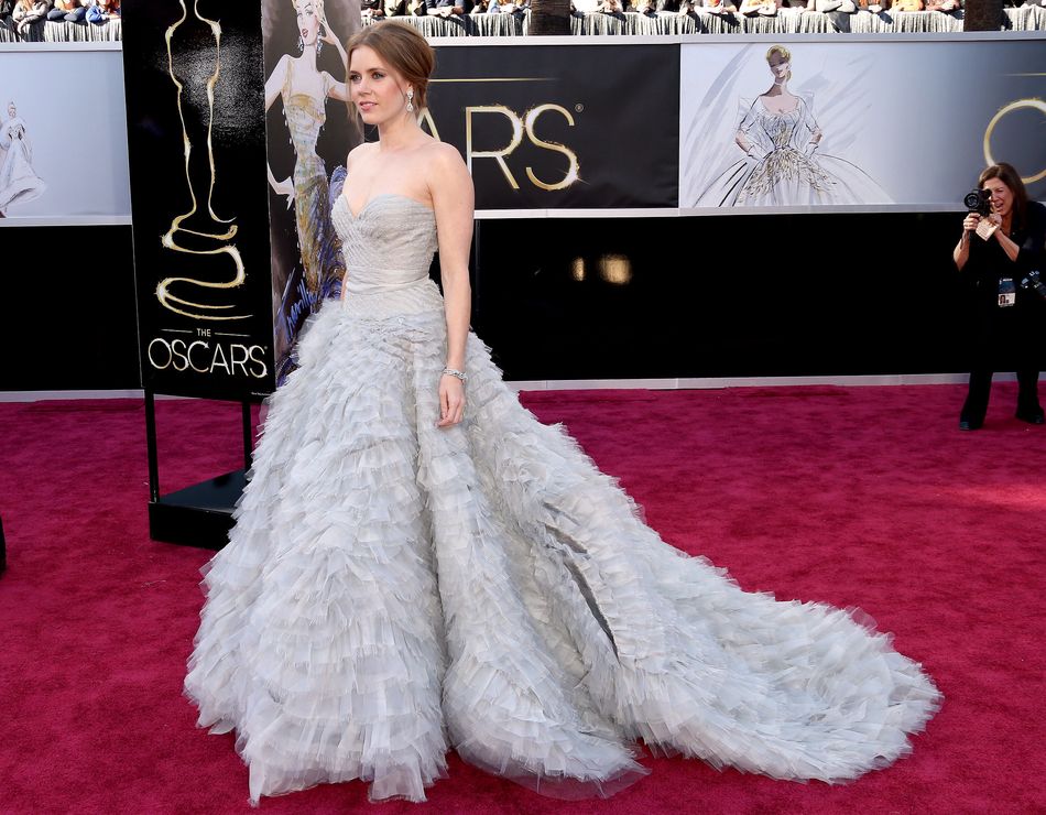 Oscar De La Renta likes to create fantasy and drama in his dresses and this gown worn by Amy Adams is what dreams are made of. More is more, and is definitely more.