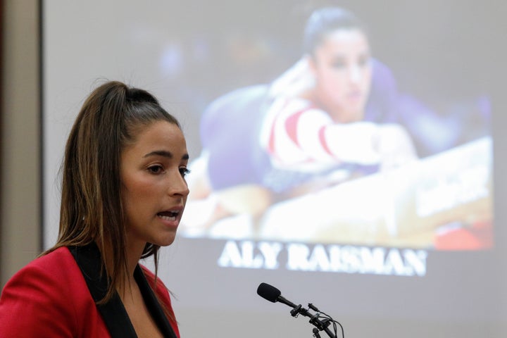 Olympic gold medalist Aly Raisman has filed a lawsuit against the U.S. Olympic Committee. Here, she speaks at the sentencing hearing for Larry Nassar, a former team USA Gymnastics doctor, in Lansing, Michigan, Jan. 19.