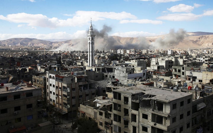 Smoke rises from besieged eastern Ghouta in Damascus, Syria, on Feb. 27, 2018. 