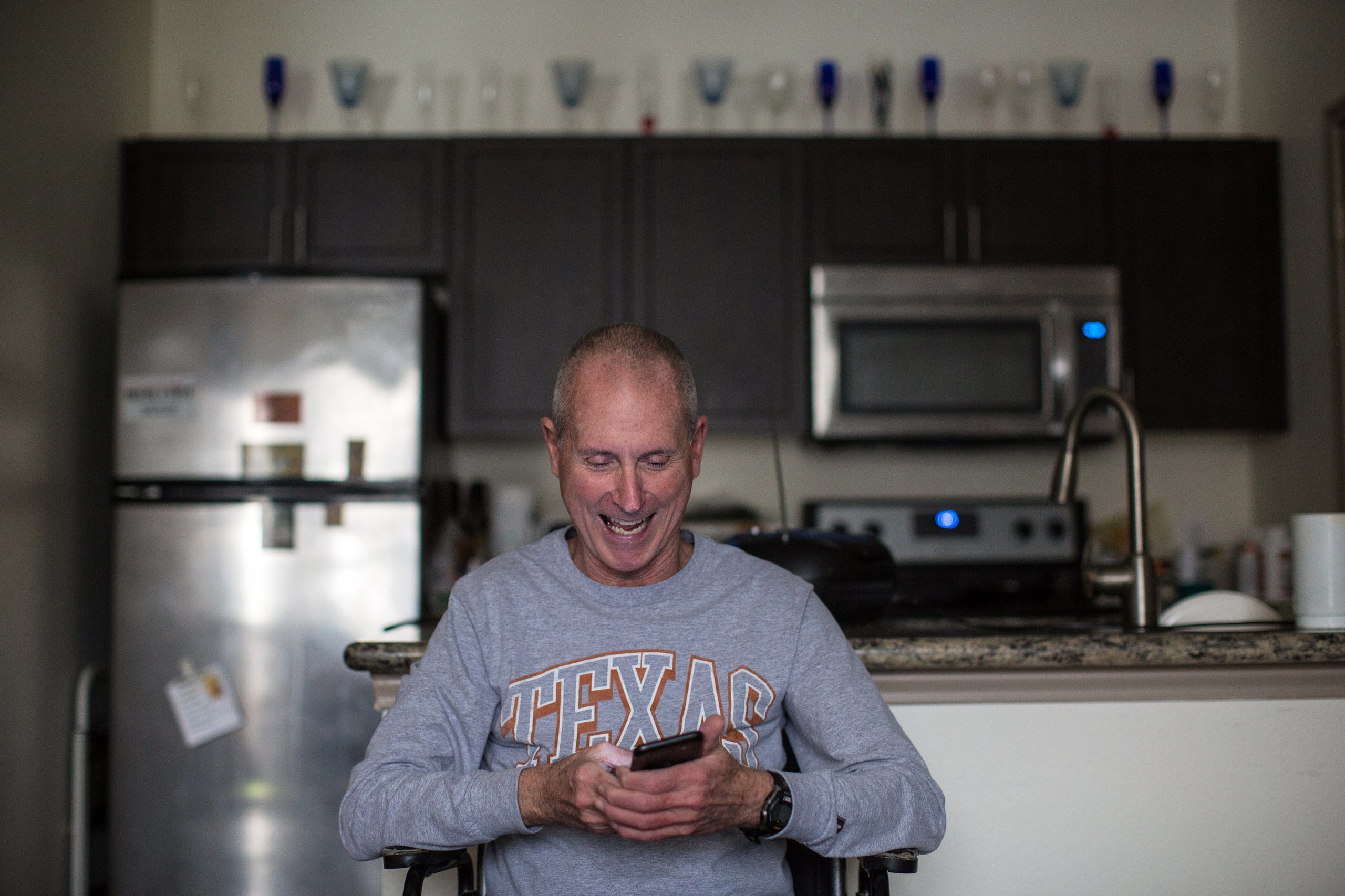 Yarling reacts to a text message from his friend Richard Blakely.