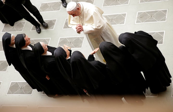 Pope Francis greets a group of nuns during the general audience in Paul VI hall at the Vatican December 20, 2017. 