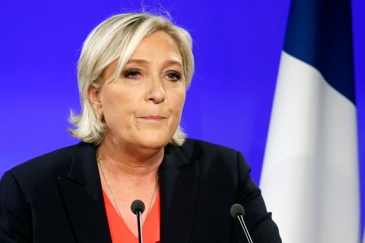 Front National party candidate Marine Le Pen makes a statement after being defeated in the French presidential elections by E