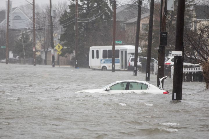 A flooded car sits in Hough's Neck due to a strong coastal storm on March 2, 2018 in Quincy, Massachusetts